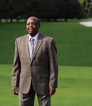 Lee Elder stands on the first tee Nov. 9 at the Masters golf tournament in Augusta, Ga.