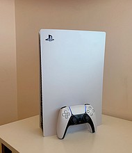 The PlayStation 5 and its new controller.
Credit:	Shannon Liao/CNN Business