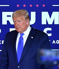 As Trump wrestles with defeat, pardons loom for allies -- and himself.
Credit:	MANDEL NGAN/AFP/Getty Images