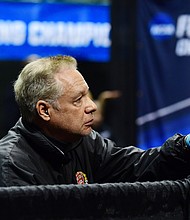 Head coach Peter Brand talks to Veronica Czyzewski of Harvard as she competes against Karolina Cieslar of St. John's in the Saber semi finals during the Division I Women's Fencing Championship held at The Wolstein Center on the Cleveland State University campus on March 24, 2019 in Cleveland, Ohio.
Credit:	Jason Miller/NCAA Photos/Getty Images
