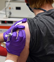 This May 4, 2020, file photo provided by the University of Maryland School of Medicine, shows the first patient enrolled in Pfizer's COVID-19 coronavirus vaccine clinical trial at the University of Maryland School of Medicine in Baltimore.
Credit: University of Maryland School of Medicine/AP