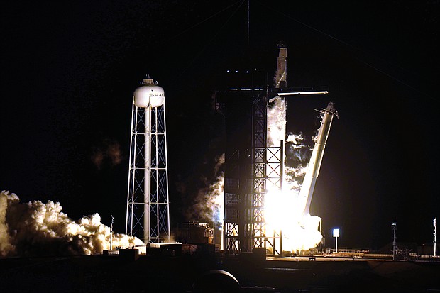 A SpaceX Falcon9 rocket, with the Crew Dragon capsule attached, lifts off from Kennedy Space Center in Cape Canaveral, Fla., last Sunday, with Cmdr. Victor Glover as pilot.