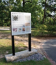 A temporary sign at the University of Richmond now marks the Westham Burial Ground for enslaved people who worked on a plantation that became the campus. The signs tell what is known about the people, the burial site and its desecration and details the university’s plans to memorialize it. Shelby Driskill, a UR graduate researcher, is credited with the initial study that brought the site to public attention. Noted historian Dr. Lauranett Lee and Ms. Driskill are leading UR’s commemorative initiative and have produced a comprehensive report to assist in that effort.