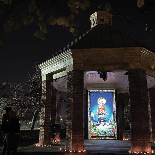 Light and art decorate the stone and brick gazebo at Petronius Jones Park on Idlewood Avenue in the Randolph neighborhood. The display, called “Marcus-David Peters Circle” and done by artists Dustin Klein, Alex Criqui, Miguel Carter-Fisher and Josh Zarambo, is just one of example of the illuminated art that was spread across the city during the InLight Richmond show that ended Sunday. The 1708 Gallery in Downtown added a new twist to the 13th edition of the artistic illumination that it sponsors. Rather than using one site as in the past, the artwork was placed in various locations around Richmond to encourage social distancing, including this small park and at the former Richmond Community Hospital building in North Side. As always, the show offered the works of a variety of Richmond area artists.