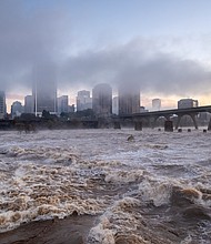 These photos offer a view of the James River as it roared through Richmond last weekend after two days of heavy rain, swelling it to its highest levels in two decades.
In Downtown, the river crested near 18 feet on Nov. 13 and 14, according to the U.S. Geological Survey, which monitors the river’s daily flow.