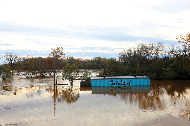 The river’s surge was fueled by the 4 to 8 inches of rain that slammed upstream sections of river to the west on Nov. 11 and 12, according
to the National Weather Service. That amount of rainfall was well above the nearly 2 inches of rain recorded on Richmond gauges. One inch of rain equals about 10 inches of snow.
As of Tuesday, the flood gates were open again as the James River had receded and was running below 3 feet at the Downtown city locks, the USGS reported.