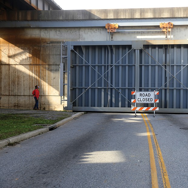 On Thursday, Nov. 12, as the river began to rise quickly, the city Department of Public Utilities closed two gates in the floodwall — at Dock Street and at Brander Street — for the first time since 1999 to protect Shockoe Bottom.