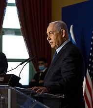 Mike Pompeo, left, and Israeli Prime Minister Benjamin Netanyahu in Jerusalem on November 19.
Credit:	Maya Alleruzzo/Pool/AFP/Getty Images
