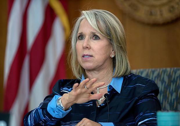 New Mexico Gov. Michelle Lujan Grisham gives her weekly update on COVID-19 in New Mexico and the state's effort to contain it during a virtual news conference from the state Capitol in Santa Fe, N.M., on July 23, 2020.
Credit:	Eddie Moore/he Albuquerque Journal/AP