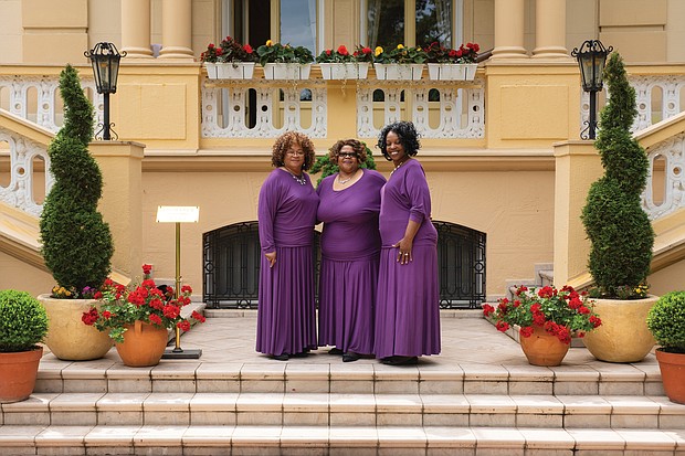 From left, Deacon Carrie Ann Jackson, the Rev. Almeta Ingram-Miller and Evangelist Cheryl Maroney-Yancey stand outside the U.S. ambassador’s residence in Belgrade, Serbia. The Ingramettes performed in cities across Serbia in May 2019.