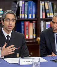Vivek Murthy, then-US Surgeon General, speaks while participating in a roundtable discussion on the impacts of climate change on public health at Howard University with President Barack Obama in Washington, DC, on April 7, 2015.
Credit:	Pool/Getty Images North America/Getty Images
