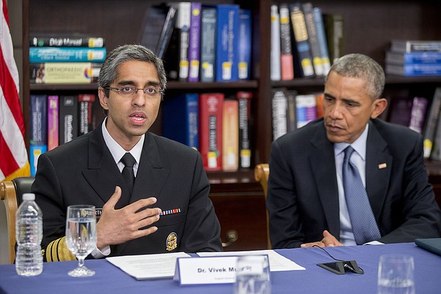 Vivek Murthy, then-US Surgeon General, speaks while participating in a roundtable discussion on the impacts of climate change on public health at Howard University with President Barack Obama in Washington, DC, on April 7, 2015.
Credit:	Pool/Getty Images North America/Getty Images