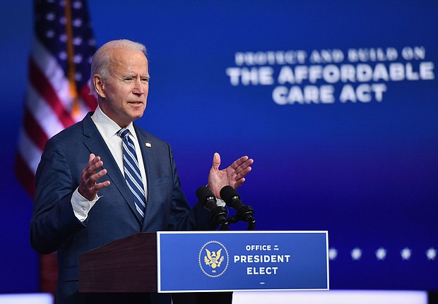 President-elect Joe Biden delivers remarks at The Queen in Wilmington, Delaware, on November 10, 2020. He has unveiled his health team that will lead the pandemic response.
Credit:	Angela Weiss/AFP/Getty Images