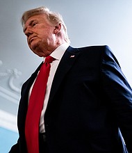 President Donald Trump leaves after speaking in the Diplomatic Room of the White House on Thanksgiving on November 26, 2020 in Washington, DC.
Credit:	Erin Schaff/Pool/Getty Images