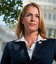 Sara Nelson, president of the Association of Flight Attendants-CWA, is pictured on the East Front of the Capitol on Wednesday, August 5, 2020.
Credit:	Tom Williams/CQ Roll Call/AP