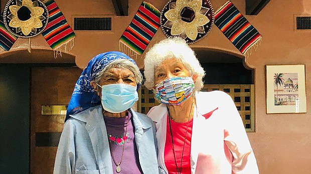 Elizabeth Havier, 89 and Sarah Parvello, 80, of the Tohono O'odham Nation in Arizona, wearing masks donated through Protect Native Elders. The mask on the left was made by Fiat Chrysler.
Credit:	Protect Native Elders
