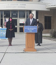 Former Gov. Terry McAuliffe, center, vows to raise teacher pay as he launches his campaign Wednesday outside Miles Jones Elementary School in South Side. Joining him are, from left, Richmond educator Dr. Milondra b. Coleman, Virginia House Majority Leader Charniele L. Herring of Alexandria, state Senate President Pro Tempore L. Louise Lucas of Portsmouth and Mayor Levar M. Stoney.