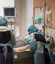 Nurses care for a Covid-19 positive patient at UMass Memorial Hospital on Dec. 4 in Worcester, Massachusetts
Credit: Allison Dinner/AFP/Getty Images