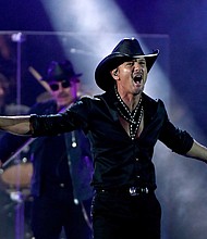 Tim McGraw, performing in 2019, shared photos of his impressive family Christmas tree.
Credit:	Ethan Miller/Getty Images