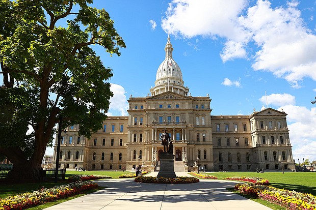 The Michigan State Capitol building is seen on October 8, 2020 in Lansing, Michigan.
Credit:	Rey Del Rio/Getty Images