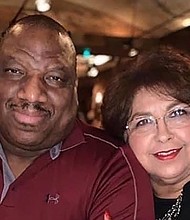 Married couple, both teachers, die of Covid-19 while holding hands with their children.
Credit:	Shawn Blackwell