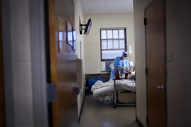 US sets Covid-19 case, hospitalization and death records ahead of key meeting for Moderna's vaccine candidate.
Credit:	Scott Olson/Getty Images