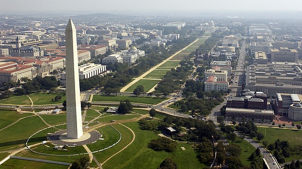 Aerial photo of the Washington Memorial with the Capitol in the background in Washington D.C. on September 26, 2003.
Credit:	Andy Dunaway/USAF via Getty Images