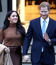 Prince Harry and Meghan Markle have released their first podcast through their multi-year deal with Spotify, saying they hope it brings "warmth, a smile and something to think about" to listeners at the end of a difficult year.
Credit:	Chris Jackson/Getty Images