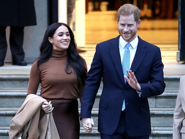 Prince Harry and Meghan Markle have released their first podcast through their multi-year deal with Spotify, saying they hope it brings "warmth, a smile and something to think about" to listeners at the end of a difficult year.
Credit:	Chris Jackson/Getty Images
