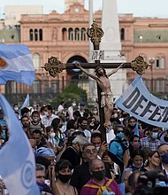 Anti-abortion activists protest against the decriminalization of abortion in Buenos Aires on Monday.
Credit:	Victor R. Caivano/AP
