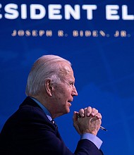 President-elect Joe Biden speaks during a foreign policy and national security virtual meeting at the Queen Theater December 28, 2020, in Wilmington, Delaware.
Credit:	BRENDAN SMIALOWSKI/AFP/Getty Images