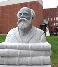 A sculpture of Martin Henry Freeman, the first Black college president in the United States, is on display on the sculpture trail in downtown Rutland, Vt., where he was born in 1826. Mr. Freeman, an 1849 graduate of Middlebury College, became president in 1856 of Allegheny Institute, which later became Avery College, in Pittsburgh.