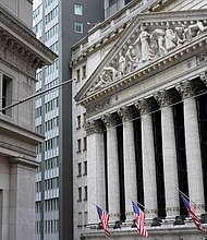 The New York Stock Exchange is seen in New York, on November 23, 2020. The Dow tumbled more than 600 points on the first trading day in 2021.
Credit:	Seth Wenig/AP