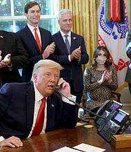 This image shows President Donald Trump speaking with Israeli Prime Minister Benjamin Netanyau on the phone in the Oval Office on October 23, 2020, in Washington, DC. There were 18 attempted calls from the White House to the Georgia secretary of state's office between the election and the phone call on January 2, 2021, a source with knowledge and a Georgia state official confirmed to CNN.
Credit:	Win McNamee/Getty Images North America/Getty Images