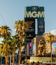 Signage is displayed in front of the MGM Grand Hotel and Casino in Las Vegas, Nevada, on July 26, 2020. The company made an $11 billion bid for a UK gambling group.
Credit:	Roger Kisby/Bloomberg/Getty Images