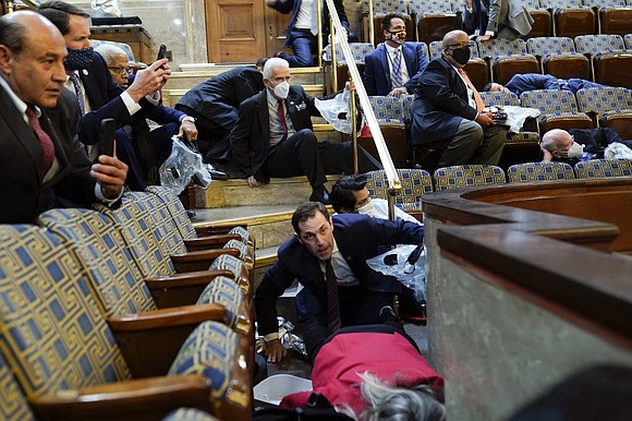 Violent protesters loyal to President Donald Trump stormed the U.S. Capitol on Wednesday and forced lawmakers into hiding, in a ... Violent protesters loyal to President Donald Trump stormed the U.S. Capitol on Wednesday and forced lawmakers into hiding, in a ...