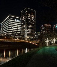 Richmond’s skyline comes to life during the holiday season, with the glow of lights embracing Downtown and the riverfront. The seasonal lighting officially got underway Dec. 4, with RVA Illuminates. This photograph of the Downtown skyline was taken from Brown’s Island.