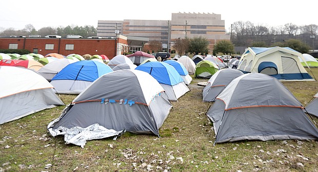 Dozens of tents house the homeless at “Cathy’s Camp,” a tent city that sprang up adjacent to the city’s winter overflow shelter and across the street from the Richmond Justice Center on Oliver Hill Way. The city razed the encampment in late March, moving people to area hotels during the COVID-19 crisis.