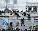 Supporters of President Trump scale the west wall of the U.S. Capitol on Wednesday before breaking windows and storming the building, where they took over the Senate and House chambers and several offices. Police finally secured the building around 6:20 p.m.