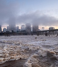 The James River, swollen and roaring after two days of heavy rain in mid-November, rolls through Richmond. The river reached its highest levels in two decades, cresting near 18 feet on Nov. 13 and 14 in Downtown. Two of the gates in the city’s floodwall were closed for the first time since 1999 to protect Shockoe Bottom.