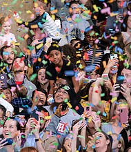 More than 2,000 people bring in the 2020 new year early at the stroke of noon on Dec. 31 at the Science Museum of Virginia during a celebration geared toward youngsters and their families.