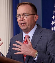 Mick Mulvaney joins others in resigning from his post as special envoy to Northern Ireland. Pictured here during a briefing at the White House on October 17, 2019, in Washington, DC, Mulvaney was then acting White House chief of staff.
Credit:	Win McNamee/Getty Images