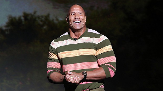 Dwayne Johnson, seen here in 2019, is launching a healthy energy drink called ZOA.
Credit:	Jesse Grant/Getty Images for Disney
