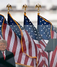 President Donald Trump arrives to speak at a rally protesting the electoral college certification of Joe Biden as President, Wednesday, Jan. 6, 2021, in Washington.
Credit:	Evan Vucci/AP
