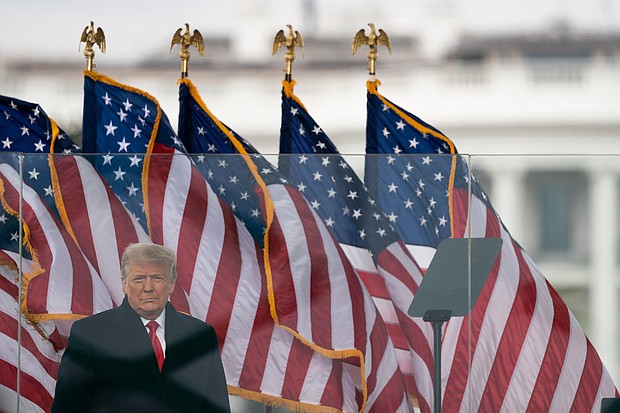 President Donald Trump arrives to speak at a rally protesting the electoral college certification of Joe Biden as President, Wednesday, Jan. 6, 2021, in Washington.
Credit:	Evan Vucci/AP