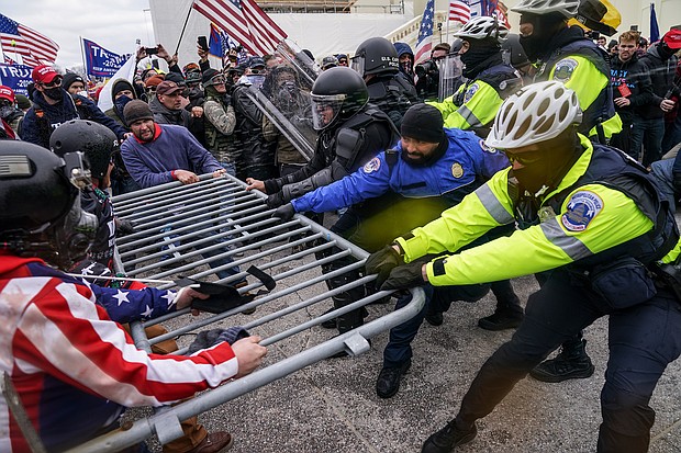 Calls for new protests in Washington, DC, and states across the country have law enforcement bracing for more possible violence after pro-Trump rioters stormed the US Capitol on Jan.6.
Credit:	John Minchillo/AP