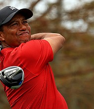 ORLANDO, FLORIDA - DECEMBER 20: Tiger Woods of the United States hits his tee shot on the 15th hole during the final round of the PNC Championship at the Ritz Carlton Golf Club on December 20, 2020 in Orlando, Florida. (Photo by Mike Ehrmann/Getty Images)
Credit:	Mike Ehrmann/Getty Images North America/Getty Images