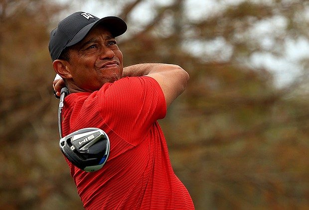 ORLANDO, FLORIDA - DECEMBER 20: Tiger Woods of the United States hits his tee shot on the 15th hole during the final round of the PNC Championship at the Ritz Carlton Golf Club on December 20, 2020 in Orlando, Florida. (Photo by Mike Ehrmann/Getty Images)
Credit:	Mike Ehrmann/Getty Images North America/Getty Images