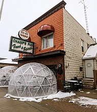 For millions of small businesses still struggling to make ends meet, Jan. 11 was the first day to apply for a new, potentially forgivable federal loan. In this photo, patrons dine in igloos outside of a pub in Brighton, Mich.
Credit:	Kimberly P. Mitchell/Imagn/USA Today