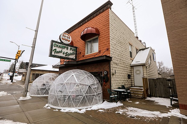 For millions of small businesses still struggling to make ends meet, Jan. 11 was the first day to apply for a new, potentially forgivable federal loan. In this photo, patrons dine in igloos outside of a pub in Brighton, Mich.
Credit:	Kimberly P. Mitchell/Imagn/USA Today